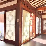 A Traditional Korean House With A Yard