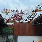 A Traditional Korean House With A Yard