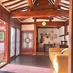 A Traditional Korean House With A Yard