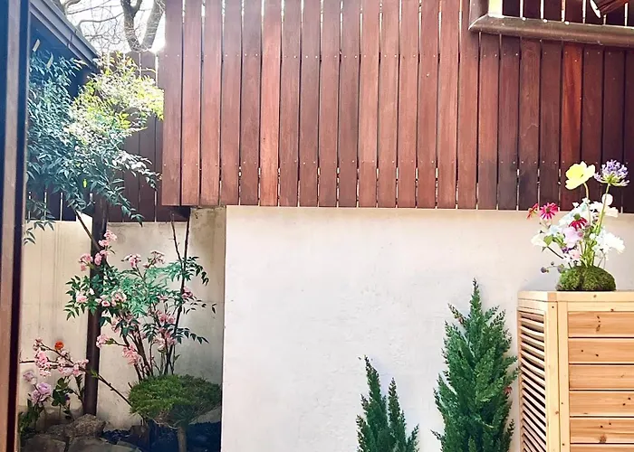 A Traditional Korean House With A Yard