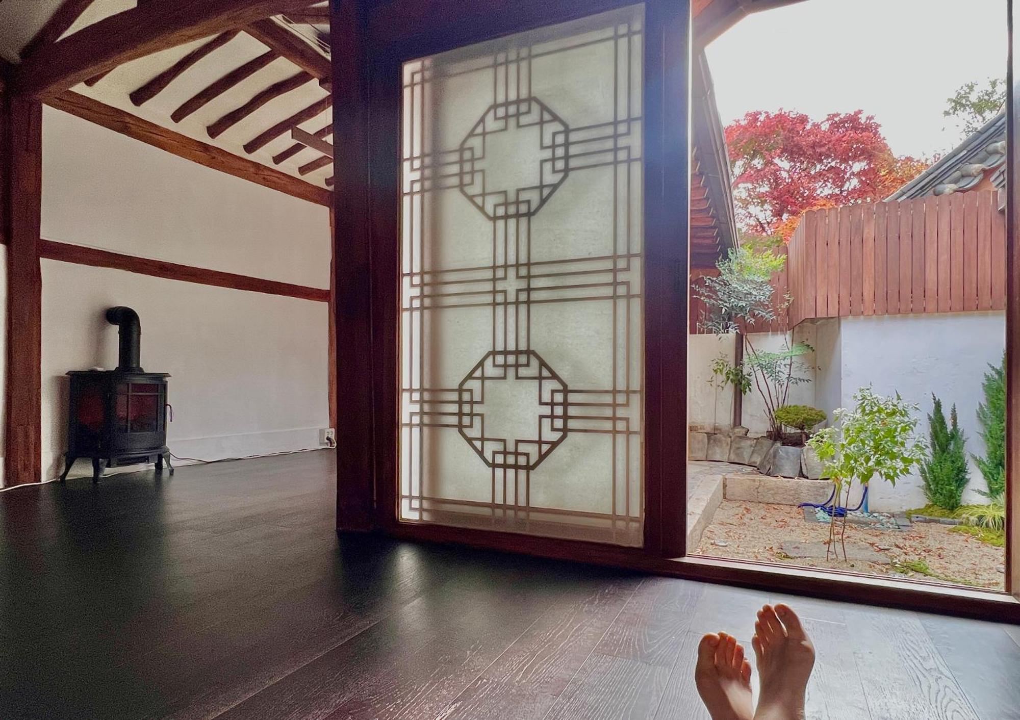 A Traditional Korean House With A Yard