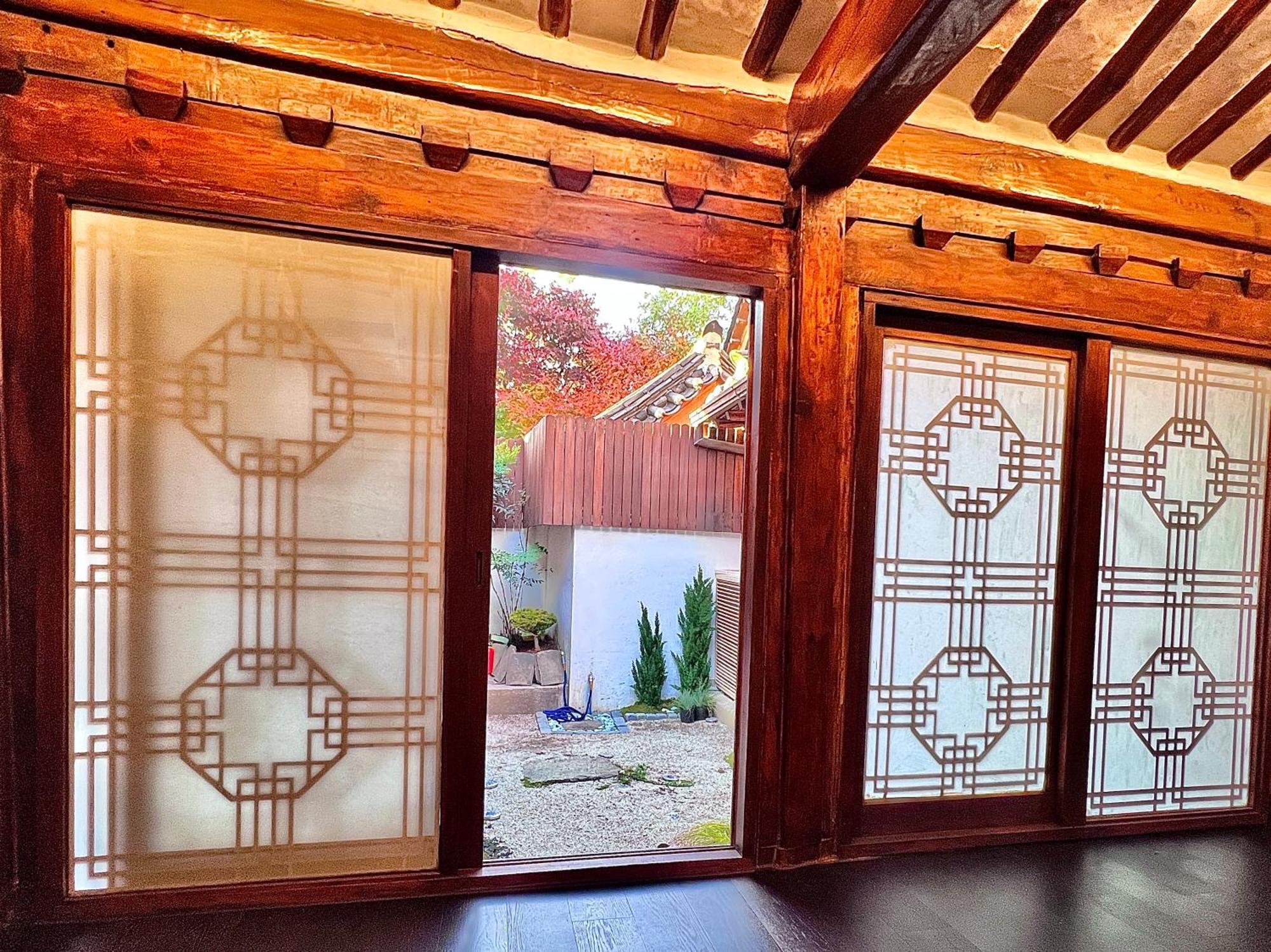 A Traditional Korean House With A Yard